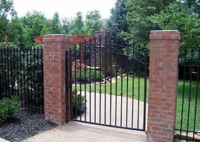 Brick pillars and iron gate